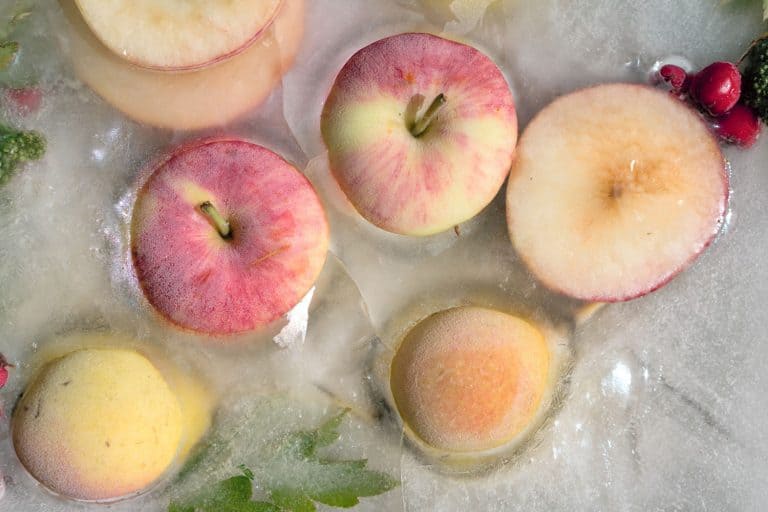 Background fresh season apple in ice cube with air bubbles, Can You Freeze Apples With The Skin On?