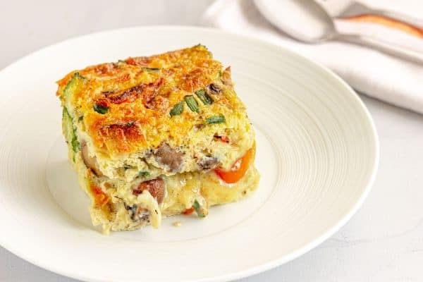 A delicious and freshly baked egg casserole on a white plate, Can You Freeze An Egg Casserole?