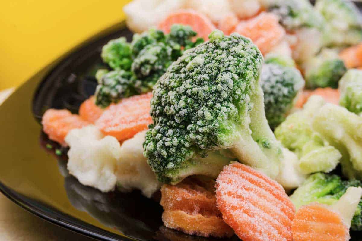 Broccoli, carrots, frozen vegetables on a plate close-up, Can You Freeze Vegetables Without Blanching?