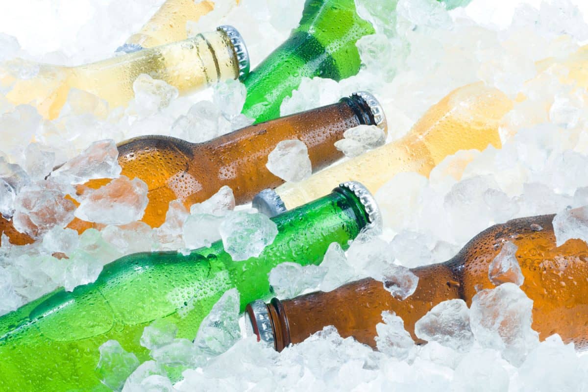 Different flavored beer chilled in ice