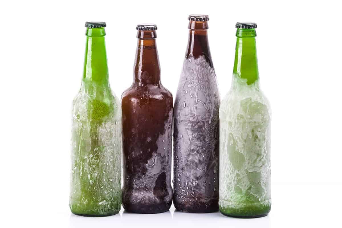 Frozen ice cold beer on a white background
