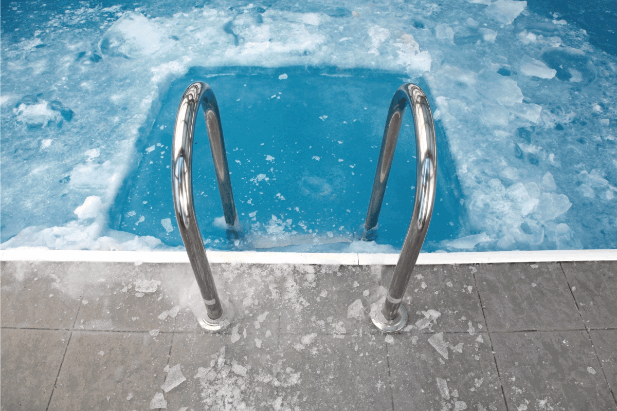 Steps in the frozen blue pool ice-hole. What Happens If A Pool Freezes