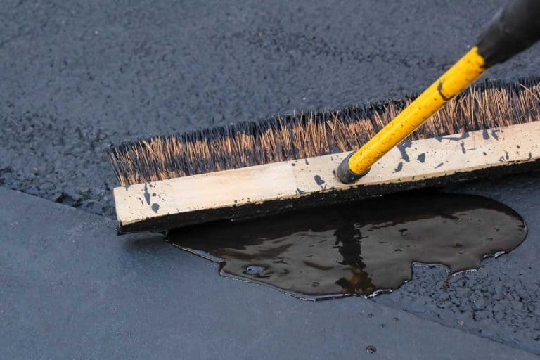 Asphalt blacktop driveway sealing paving with brush, What Happens If Driveway Sealer Freezes?