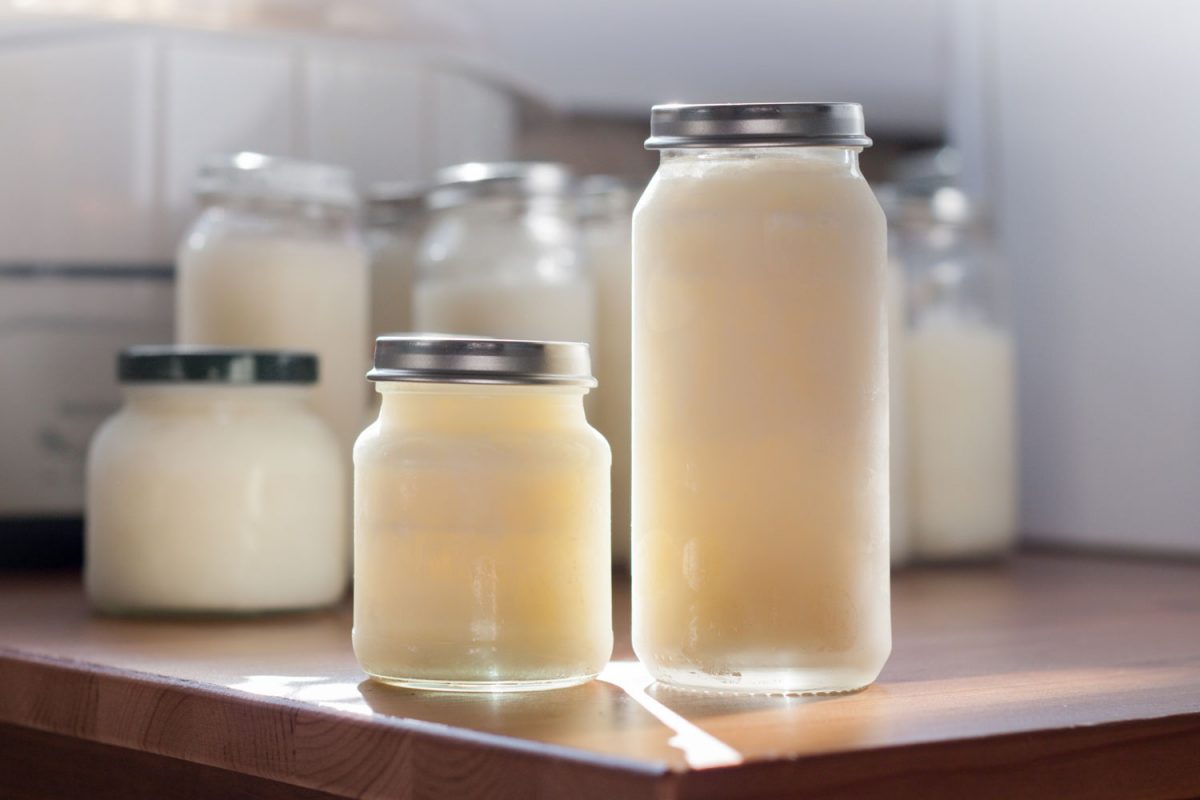 Different sizes of jars of milk