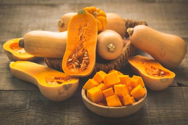 Fresh butternut squash on the wooden table, How To Freeze Butternut Squash