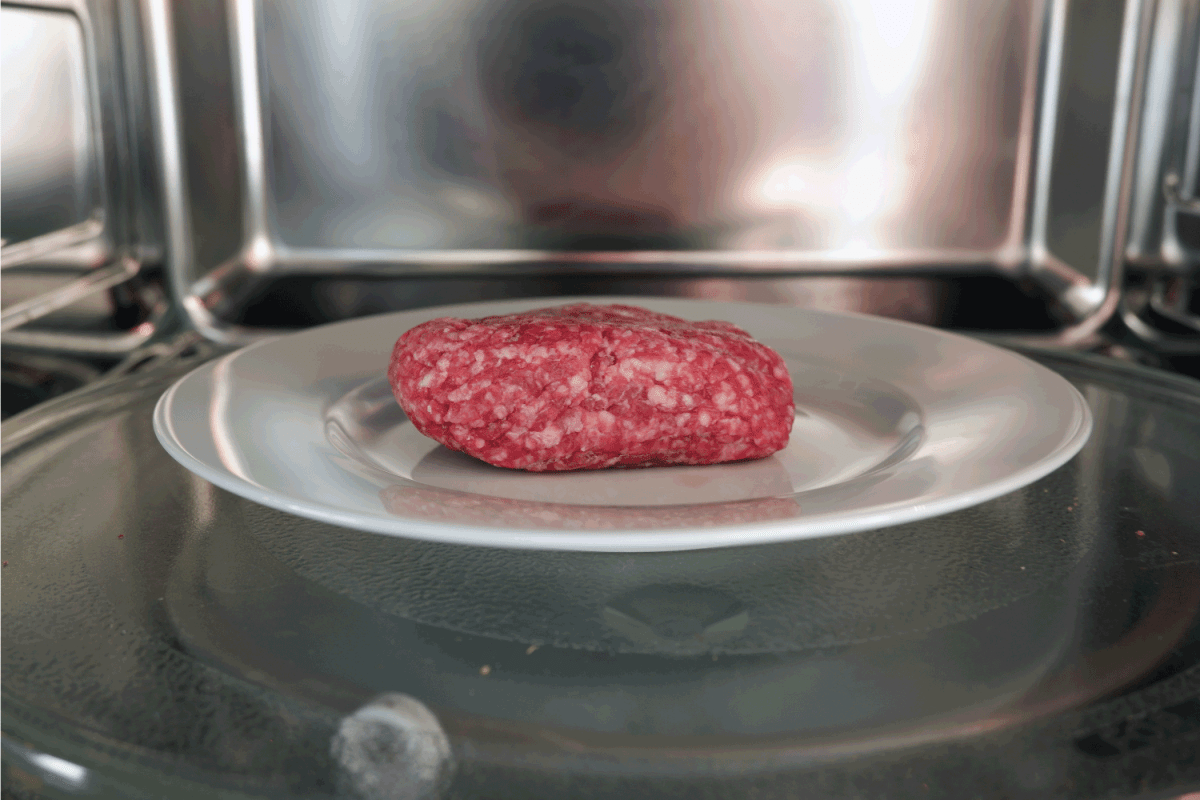 Frozen minced meat defrosted in a microwave oven