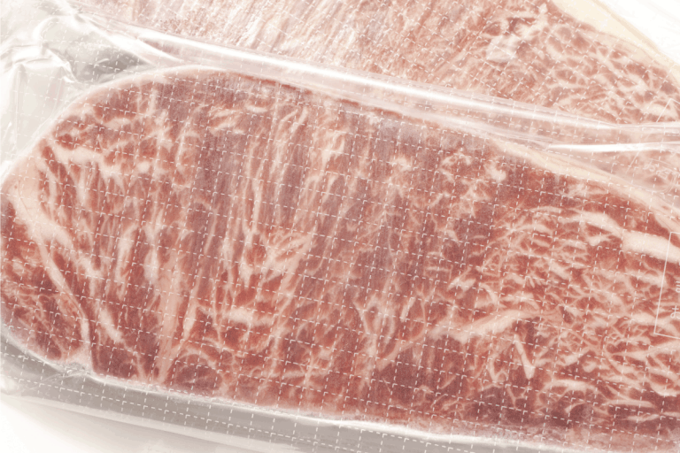frozen steak inside a plastic vacuum pack, How Long Do Omaha Steaks Last In The Freezer