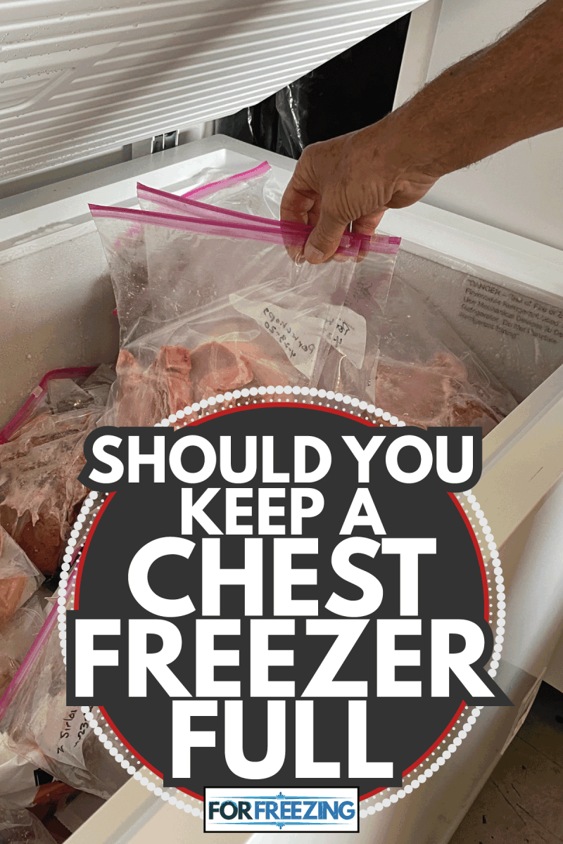 Freezer in a home for portioned frozen meats and meals so food can be purchased in bulk and stored during the pandemic.. Should You Keep A Chest Freezer Full