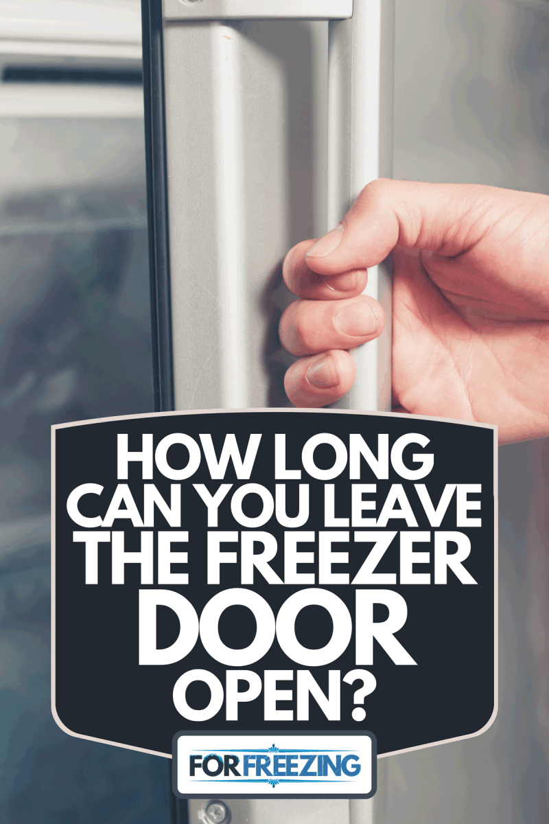 A hand of a young man opening a freezer door, How Long Can You Leave The Freezer Door Open?