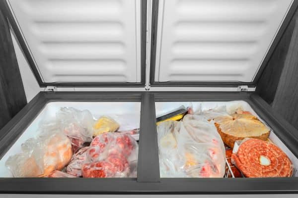 A freezer filled with meats, sausages, and other meat products, How To Clean A Freezer Door Seal
