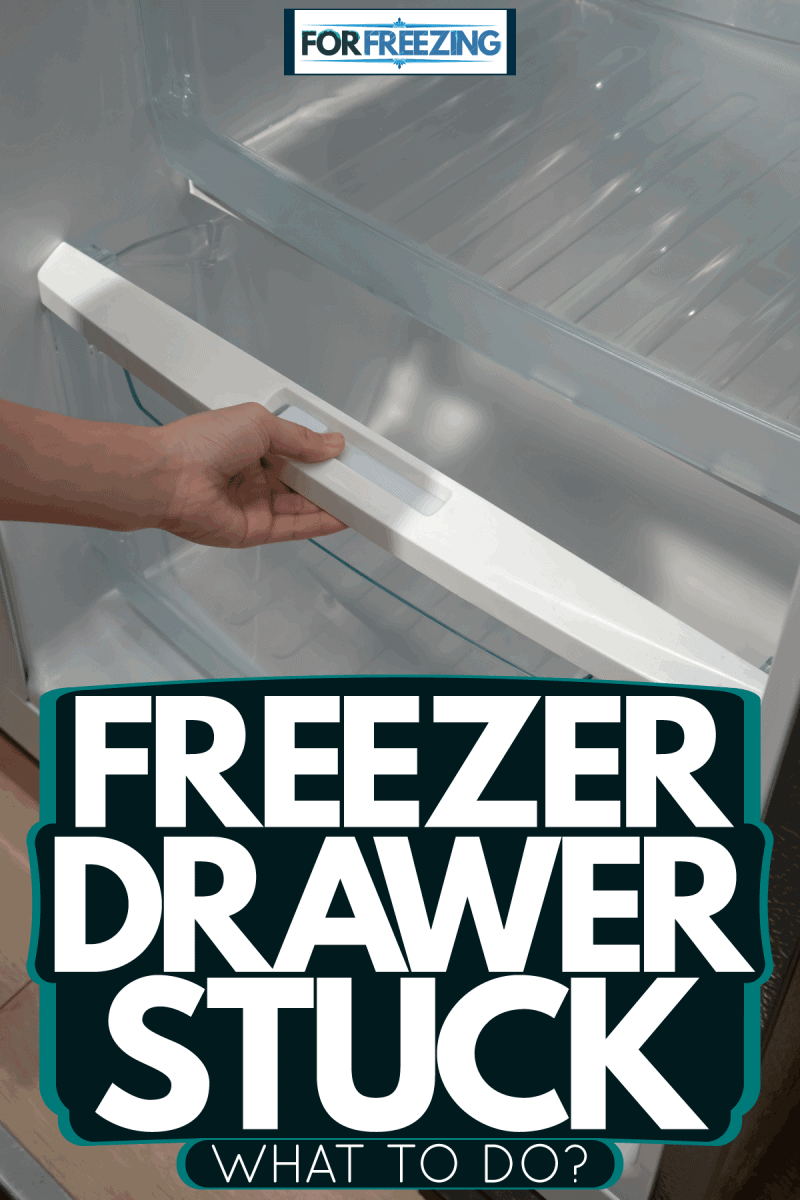 A woman opening the freezer drawer, Freezer Drawer Stuck - What To Do?