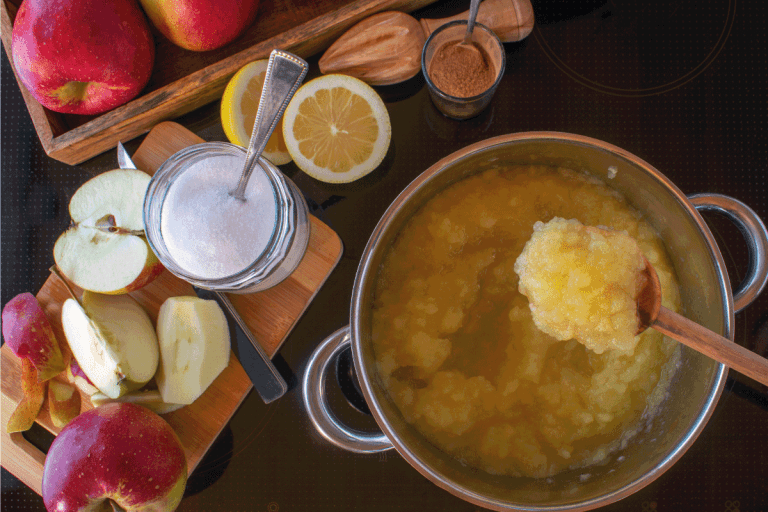cooking homemade traditional apple sauce on a stove. With fresh ingredients. How Long Does Frozen Applesauce Last