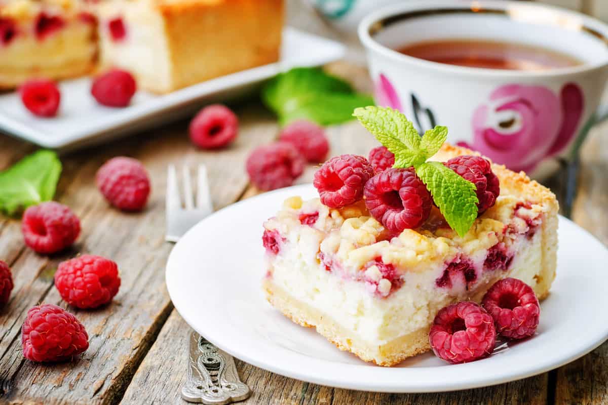 A plate full of a delicious cherry cake