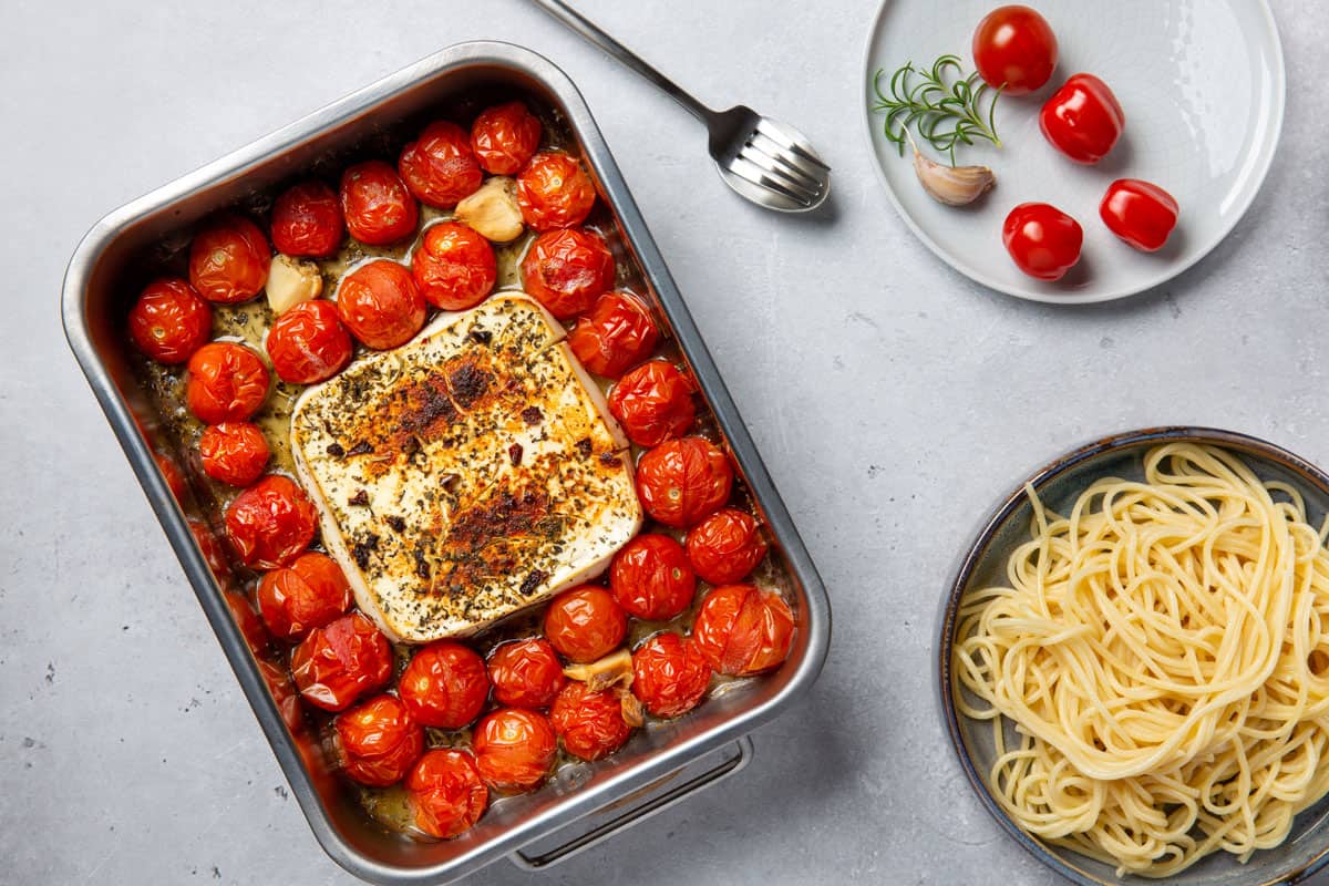 Oven baked feta pasta made of cherry tomatoes, feta cheese, garlic and herbs