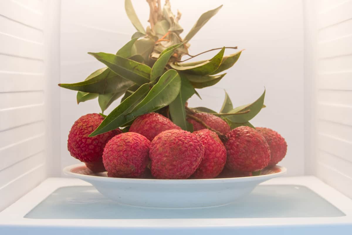 A whole freshly harvested lychee