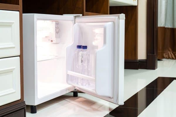 White mini fridge placed in the pantry, How To Defrost Hisense Mini Fridge