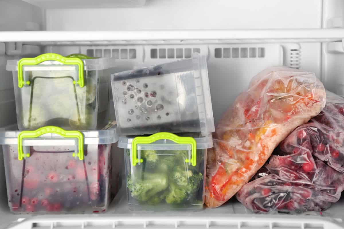 Plastic containers with products in freezer