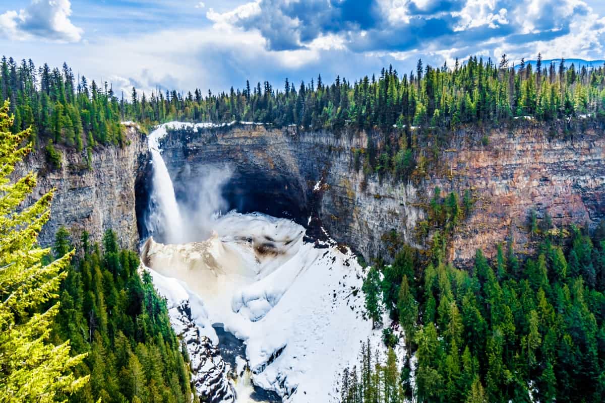 The spectacular ice and snow cone in winter at the bottom of Helmcken Falls on the Murtle River in Wells Gray Provincial Park near the town of Clearwater, British Columbia, Canada
